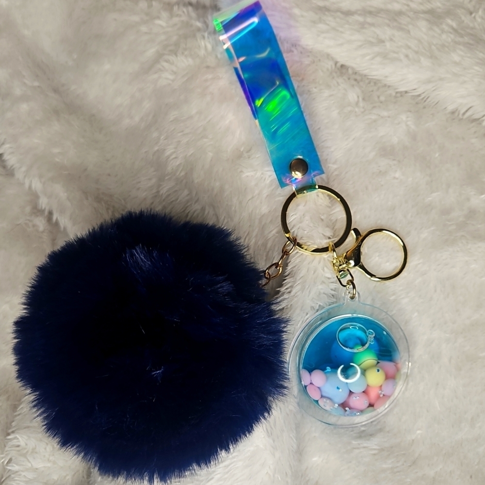 Saturn Inspired Navy Fluffy Pom Pom Keychain - Picture 3 of 5